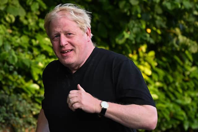 His race is run as an MP  (for now) so Boris Johnson has plenty of time for jogging and, free from stress, less cause for those sprints to the fridge (Picture: Justin Tallis/AFP via Getty Images)