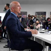 US CEO of Amazon Jeff Bezos waits before a meeting with Nigeria's president, Britain's Prince of Wales and France's president as part of the World Leaders' Summit of the COP26 UN Climate Change Conference in Glasgow on November 1, 2021. Photo by ALAIN JOCARD/AFP via Getty Images.