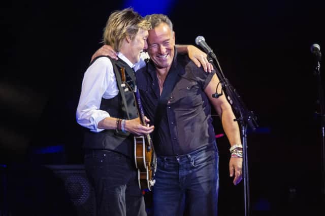 Paul McCartney, left, and Bruce Springsteen perform at Glastonbury Festival in Worthy Farm, Somerset, England, Saturday, June 25, 2022.