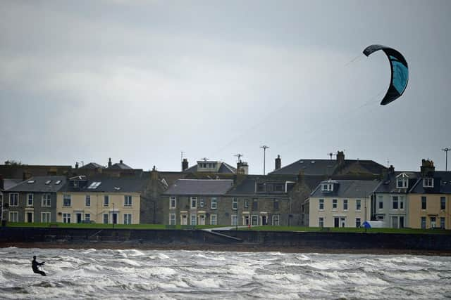 Harnessing the power of the sun, wind and waves can lead to a bright future for the UK economy, while also tackling climate change (Picture: Jeff J Mitchell/Getty Images)