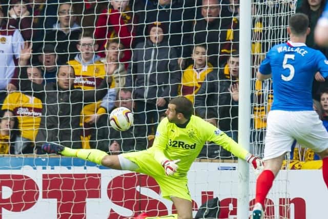 Rangers 'keeper Cammy Bell can't believe he has failed to stop a deflected, looping shot from Motherwell's Marvin Johnson in the second leg of their Premiership play-off final in 2015