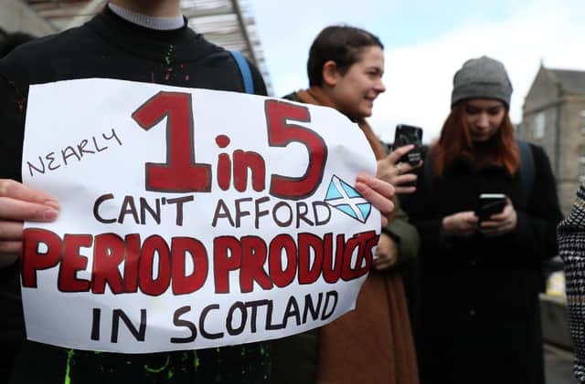Supporters of the Period Products Act, which became law this week, hold a rally outside the Scottish Parliament (Picture: Andrew Milligan/PA Wire)