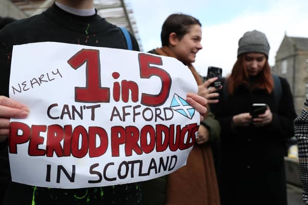 Supporters of the Period Products Act, which became law this week, hold a rally outside the Scottish Parliament (Picture: Andrew Milligan/PA Wire)