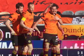 Dundee United's Adrian Sporle celebrates his side's winner in the 1-0 victory over struggling Aberdeen  (Photo by Craig Foy / SNS Group)