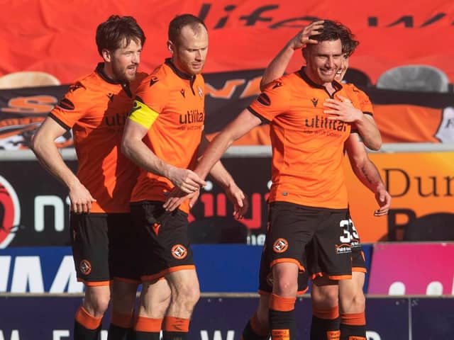 Dundee United's Adrian Sporle celebrates his side's winner in the 1-0 victory over struggling Aberdeen  (Photo by Craig Foy / SNS Group)