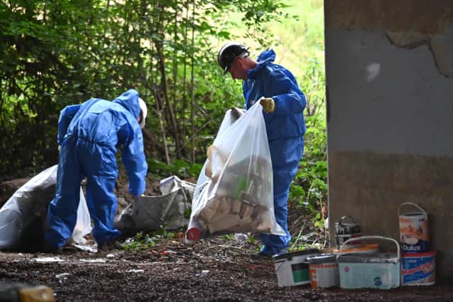 Organised crime gangs are thought to have been behind "systematic" illegal dumping at the site, under a motorway flyover on the east side of Glasgow. Picture: John Devlin