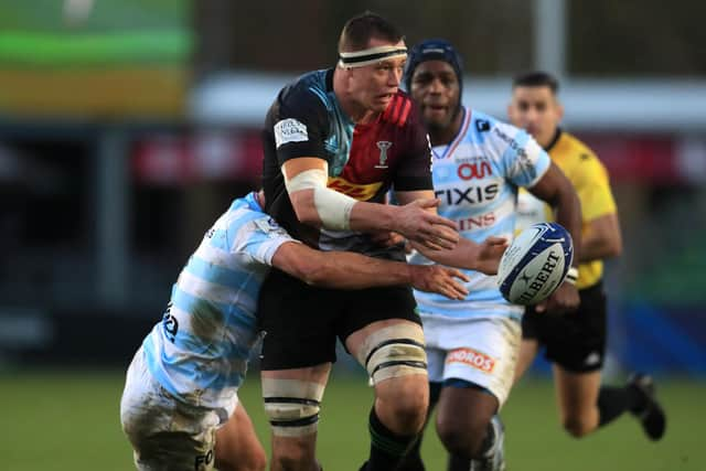 Harlequins' Glen Young will join Edinburgh for next season.