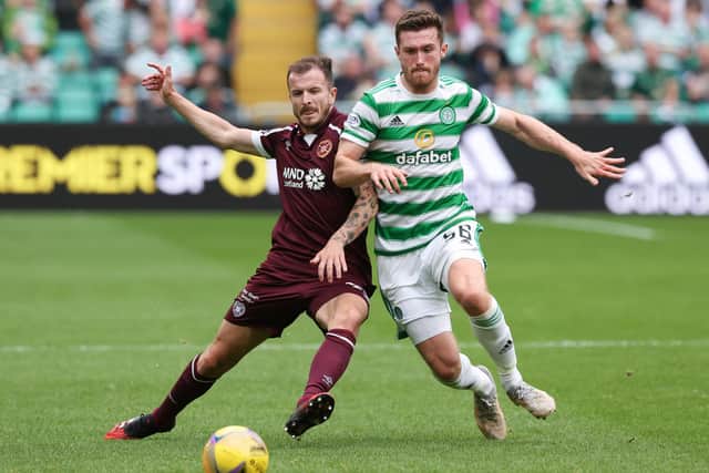 Celtic's Anthony Ralston in a challenge with Hearts' Andy Halliday during the Premier Sports Cup 3-2 win on Sunday. The right-back says he "welcomes the challenge" that will be provided by the club's nearing-completion pursuit of another right-back in Croatian international Josip Juranovic, (Photo by Craig Williamson / SNS Group)