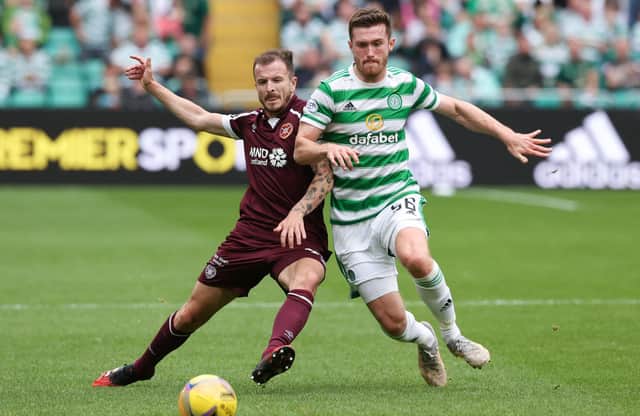 Celtic's Anthony Ralston in a challenge with Hearts' Andy Halliday during the Premier Sports Cup 3-2 win on Sunday. The right-back says he "welcomes the challenge" that will be provided by the club's nearing-completion pursuit of another right-back in Croatian international Josip Juranovic, (Photo by Craig Williamson / SNS Group)