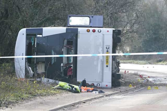 The scene on the A39 Quantock Road in Bridgwater after a double-decker bus overturned in a crash involving a motorcycle. Picture date: Tuesday January 17, 2023.
