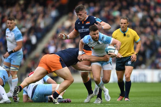 Glasgow Warriors' Ali Price is tackled by Edinburgh's WP Nel during the 1872 Cup match at BT Murrayfield. (Photo by Ross MacDonald / SNS Group)