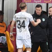 Shaun Maloney congratulates Elias Melkersen after his two goals for Hibs.