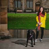 Dr Ilyena Hirskyj-Douglas, with her ten-year-old dog Zack during an experiment with the DogPhone.