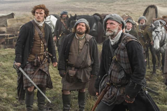 Sam Heughan, Bill Paterson, Graham McTavish in season one of Outlander, 2014. Pic: Photo by Starz! Movie Channel/Courtesy/Shutterstock