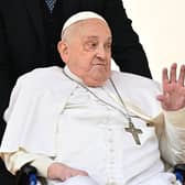 Pope Francis greets the crowd during a surprise appearance at the end of the mass for Palm Sunday at St Peter's Square in the Vatican on April 13, 2025. Picture: Tiziana FABI / AFP via Getty Images.