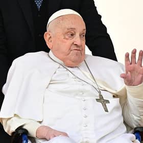 Pope Francis greets the crowd during a surprise appearance at the end of the mass for Palm Sunday at St Peter's Square in the Vatican on April 13, 2025. Picture: Tiziana FABI / AFP via Getty Images.