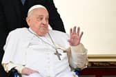 Pope Francis greets the crowd during a surprise appearance at the end of the mass for Palm Sunday at St Peter's Square in the Vatican on April 13, 2025. Picture: Tiziana FABI / AFP via Getty Images.