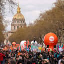 Protestors take part in the 11th day of action after the government pushed a pensions reform through parliament without a vote, using the article 49.3 of the constitution, in Paris on April 6, 2023.
