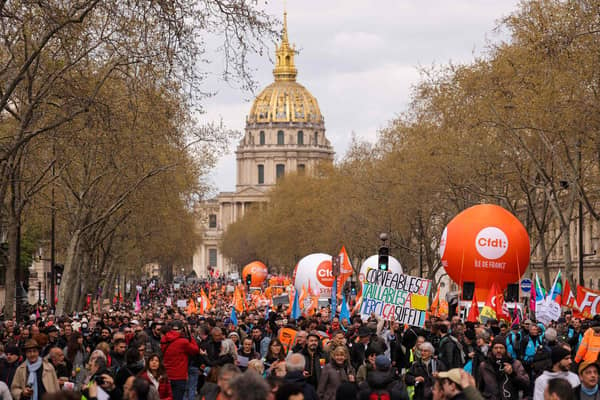 Protestors take part in the 11th day of action after the government pushed a pensions reform through parliament without a vote, using the article 49.3 of the constitution, in Paris on April 6, 2023.