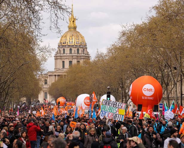 Protestors take part in the 11th day of action after the government pushed a pensions reform through parliament without a vote, using the article 49.3 of the constitution, in Paris on April 6, 2023.