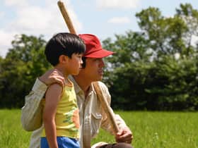 Steve Yeun and Alan Kim in Minari