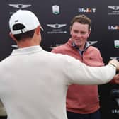 Rory McIlroy embraces Bob MacIntyre after the pair had found themselves involved in a thrilling late title battle in the Genesis Scottish Open in East Lothian. Picture: Andrew Redington/Getty Images.