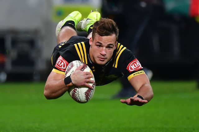 Wes Goosen scores a try for Hurricanes against the British and Irish Lions during the 2017 tour. Picture: MARTY MELVILLE/AFP via Getty Images)