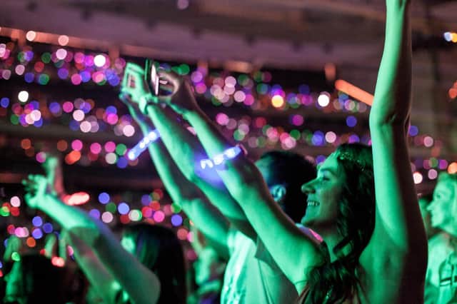 Thousands of revellers wearing LED wristbands are expected to light up Princes Street during Edinburgh's Hogmanay celebrations.