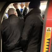London trains remain packed despite new government measures.