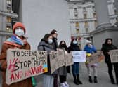 Protesters hold placards during a rally outside of the Ukrainian Ministry of Foreign Affair in Kyiv at the weekend.