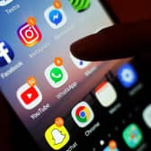 Social media app WhatsApp, displayed on a mobile phone screen. A watchdog has reprimanded a health board after staff members shared patients’ personal data on WhatsApp hundreds of times. Picture: Yui Mok/PA Wire