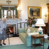 Queen Elizabeth II, left, smiles at Liz Truss during an audience at Balmoral, Scotland, where she invited the newly elected leader of the Conservative party to become Prime Minister and form a new government,
