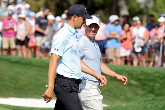 Jordan Spieth and Rory McIlroy chat during the second round of THE PLAYERS Championship on the Stadium Course at TPC Sawgrass in Florida. Picture: Kevin C. Cox/Getty Images.