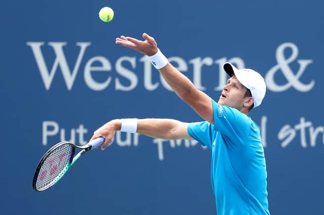 Hubert Hurkacz of Poland serves to Andy Murray of Great Britain during the Western & Southern Open at Lindner Family Tennis Center in Cincinnati.