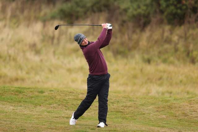 Marc Warren plays his second shot on the 12th hole during the first round of the Scottish Championship presented by AXA at Fairmont St Andrews. Picture: Richard Heathcote/Getty Images