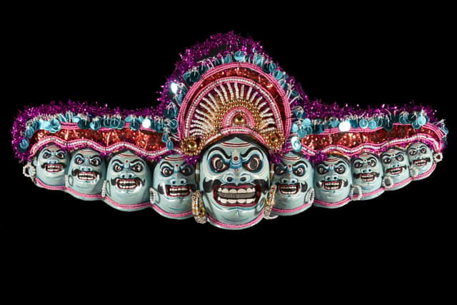 A ten headed papier-mache mask, part of a Chhou tribal dance costume depicting the Hindu demon king Ravana