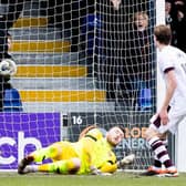 Simon Murray netted twice as Ross County took down Hearts in Dingwall.