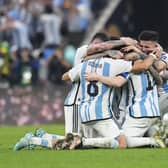 Argentina players celebrate winning the World Cup final against France.