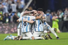 Argentina players celebrate winning the World Cup final against France.