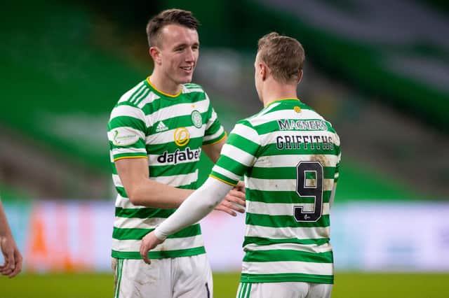 Leigh Griffiths, right, and David Turnbull embrace after the former puts Celtic 2-0 up. Picture: SNS