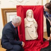 British Museum staff and Libyan Embassy charge d'affaires Mohamed Elkoni, right, view the second-century funerary statue depicting Demeter or Persephone at the Libyan Embassy in central London (Picture: Dominic Lipinski/PA)