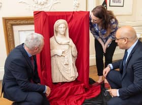 British Museum staff and Libyan Embassy charge d'affaires Mohamed Elkoni, right, view the second-century funerary statue depicting Demeter or Persephone at the Libyan Embassy in central London (Picture: Dominic Lipinski/PA)