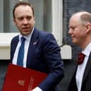 Former UK Health Secretary Matt Hancock enters Downing Street alongside Chief Medical Officer for England Professor Chris Whitty (right)