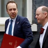 Former UK Health Secretary Matt Hancock enters Downing Street alongside Chief Medical Officer for England Professor Chris Whitty (right)