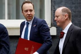Former UK Health Secretary Matt Hancock enters Downing Street alongside Chief Medical Officer for England Professor Chris Whitty (right)