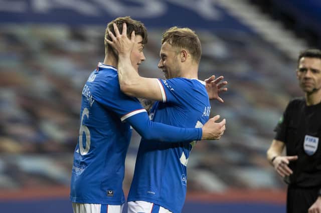 Rangers' Nathan Patterson (L) celebrates making it 4-0 with Scott Arfield during a Scottish Cup Third Round tie between Rangers and Cove Rangers at Ibrox Stadium, on April 04, 2021, in Glasgow, Scotland. (Photo by Alan Harvey / SNS Group)