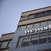 The WeWork logo is displayed outside of a shared commercial office space building in Los Angeles, California.