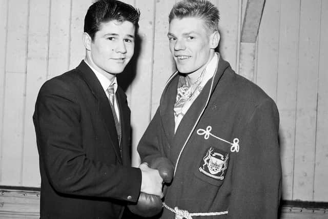 Jimmy Gibson (left) shakes hands with Dick McTaggart after the Scottish Amateur Boxing Association Championships at the Music Hall in Edinburgh's George Street in 1959