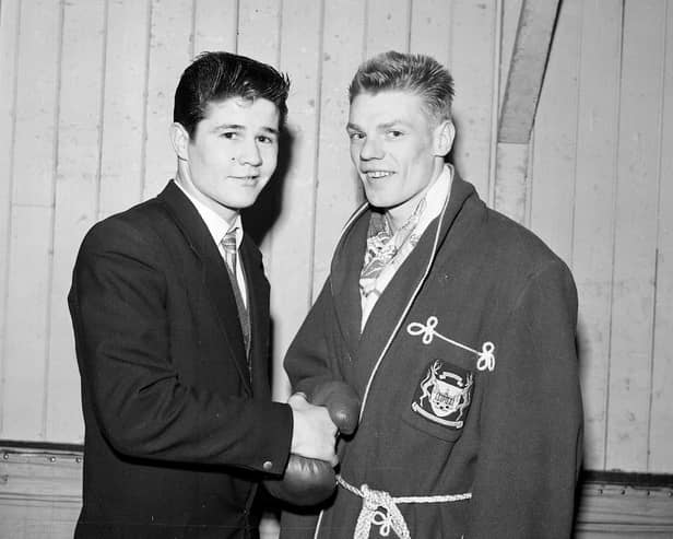 Jimmy Gibson (left) shakes hands with Dick McTaggart after the Scottish Amateur Boxing Association Championships at the Music Hall in Edinburgh's George Street in 1959