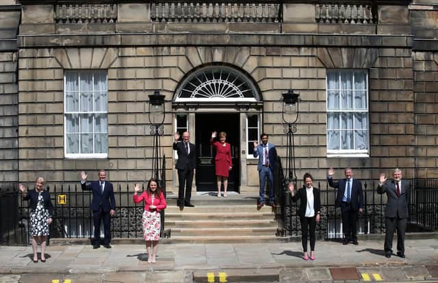 Nicola Sturgeon poses with members of her Cabinet, Shona Robison, Michael Matheson, Kate Forbes, John Swinney, Humza Yousaf, Mairi Gougeon, Keith Brown and Angus Robertson, on the steps of Bute House in Edinburgh (Picture: Andrew Milligan/PA)